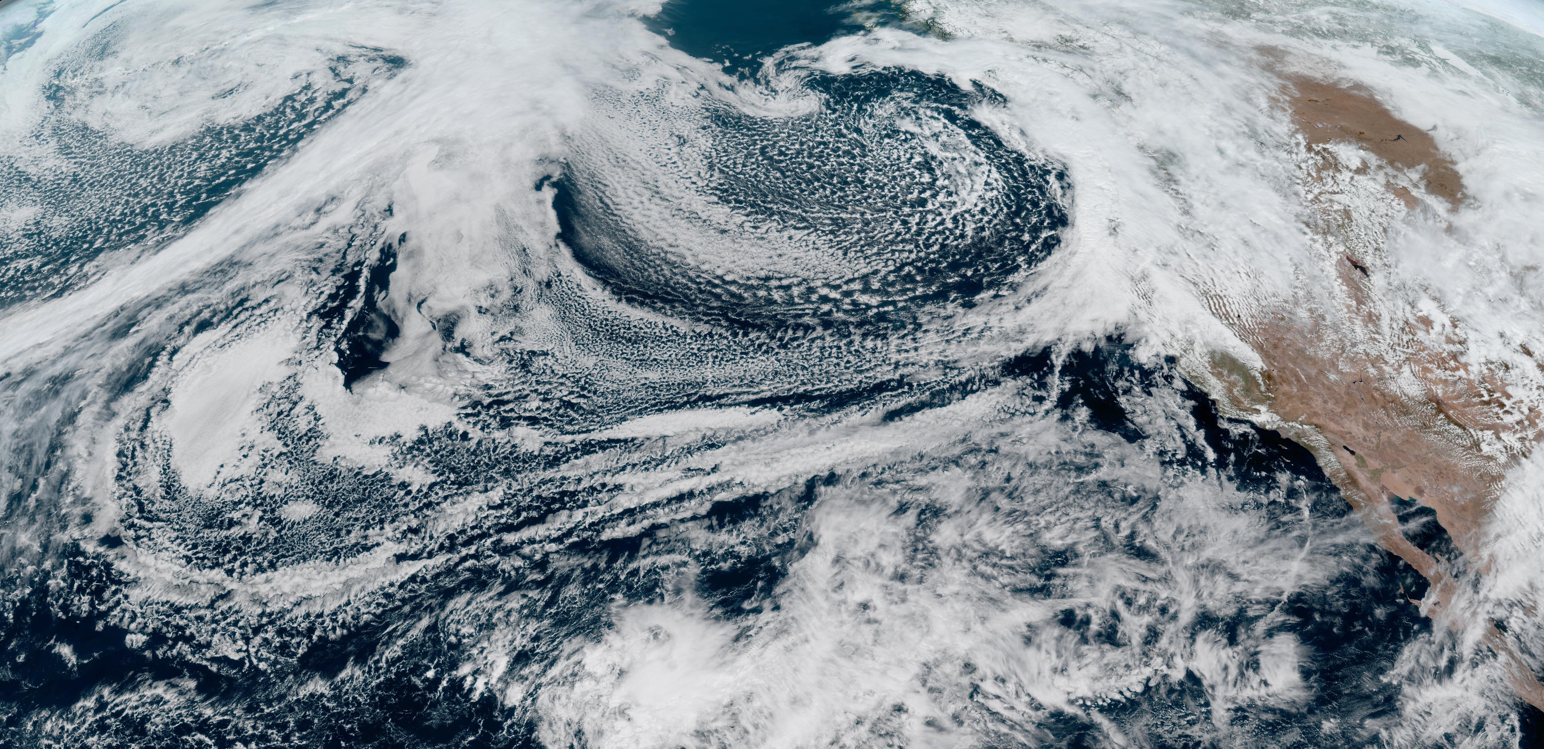 Extratropical cyclones over the North Pacific, GOES-18 GeoColor imagery